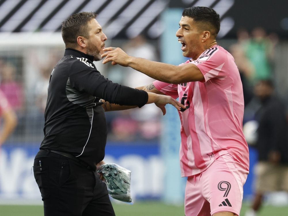 Luis Suarez sparks brawl after spitting on Seattle staffer